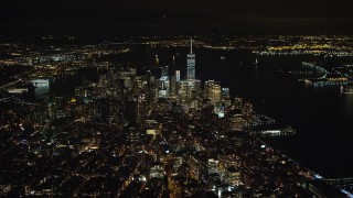 5.5K aerial stock footage of approaching Lower Manhattan skyscrapers at Night in New York City Aerial Stock Footage | AX123_071