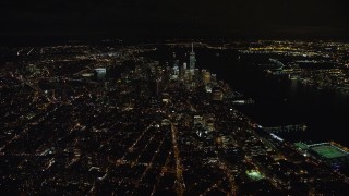 5.5K aerial stock footage of approaching Lower Manhattan at Night in New York City Aerial Stock Footage | AX123_078E