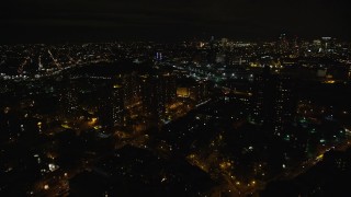 AX123_098 - 5.5K aerial stock footage orbit Brooklyn public housing at Night in NYC