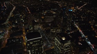 5.5K aerial stock footage orbit skyscrapers in the downtown area of Brooklyn at Night, NYC Aerial Stock Footage | AX123_119E