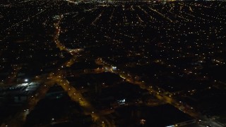 5.5K aerial stock footage of suburban neighborhoods at Night in Jamaica, New York Aerial Stock Footage | AX123_142