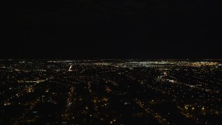 5.5K aerial stock footage of a wide view of JFK International Airport at Night in New York City Aerial Stock Footage | AX123_143E