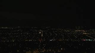 5.5K aerial stock footage of flying by the lights of residential neighborhoods at Night in Queens, New York City Aerial Stock Footage | AX123_152