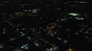 5.5K aerial stock footage fly over warehouses and suburban homes at Night in Hempstead, New York Aerial Stock Footage | AX123_161