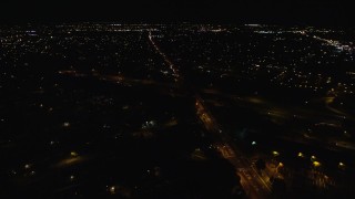 5.5K aerial stock footage orbit Southern State Parkway and Carmans Road at Night in Farmingdale, New York Aerial Stock Footage | AX123_187