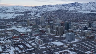 5.5K aerial stock footage of buildings in Downtown Salt Lake City, Utah at Sunrise in Winter Aerial Stock Footage | AX124_011E