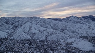 5.5K aerial stock footage approach Wasatch Range in Utah at Sunrise in Winter Aerial Stock Footage | AX124_019