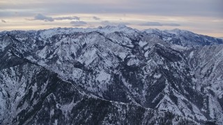 5.5K aerial stock footage approach snowy mountains in the Wasatch Range at Sunrise in Utah Aerial Stock Footage | AX124_035