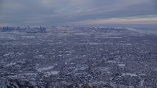 5.5K aerial stock footage of vast Salt Lake City suburban neighborhoods at sunrise in winter, Utah Aerial Stock Footage | AX124_061