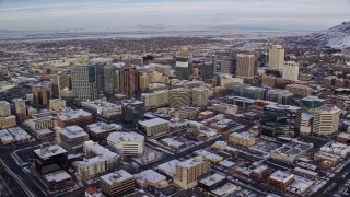 5.5K aerial stock footage approach wintery Downtown Salt Lake City, Utah with snow at sunrise Aerial Stock Footage | AX124_195E