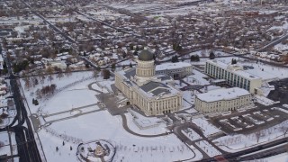 5.5K aerial stock footage approach Utah State Capitol from Downtown and orbit the building, in winter at sunrise, Salt Lake City Aerial Stock Footage | AX124_216E