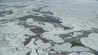 5.5K aerial stock footage flyby ice and snow in frosty marshland near Salt Lake City, Utah Aerial Stock Footage | AX125_022E