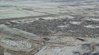 5.5K aerial stock footage of homes in the small town of Magna, Utah, with winter snow Aerial Stock Footage | AX125_289E