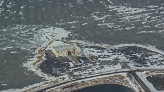 5.5K aerial stock footage orbit the Saltair Pavilion with winter snow near Magna, Utah Aerial Stock Footage | AX125_298