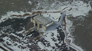 5.5K aerial stock footage of orbiting the isolated Saltair Pavilion with winter snow in Magna, Utah Aerial Stock Footage | AX125_299E