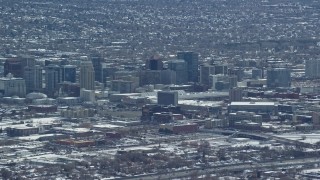 5.5K aerial stock footage of downtown buildings with winter snow in Downtown Salt Lake City, Utah Aerial Stock Footage | AX125_335