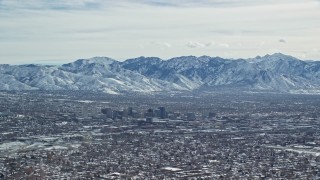 5.5K aerial stock footage of Downtown Salt Lake City, Utah, with winter snow Aerial Stock Footage | AX125_336