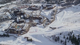 5.5K aerial stock footage of Canyons Resort in Park City with winter snow in Utah Aerial Stock Footage | AX126_110E