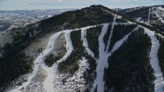 5.5K aerial stock footage orbit ski lifts on Iron Mountain at the Canyons Resort in Park City, Utah Aerial Stock Footage | AX126_117