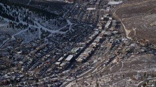 5.5K aerial stock footage orbiting the town center of Park City with wintertime snow, Utah Aerial Stock Footage | AX126_171E