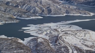 5.5K aerial stock footage of roads near the shore of Jordanelle Reservoir in winter, Heber City, Utah Aerial Stock Footage | AX126_179E