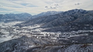 5.5K aerial stock footage approach the small town of Midway with winter snow in Utah Aerial Stock Footage | AX126_199