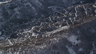 5.5K aerial stock footage approach rural small town homes with winter snow in Midway, Utah Aerial Stock Footage | AX126_203