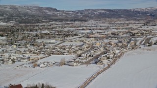 5.5K aerial stock footage orbit homes with winter snow on the outskirts of Heber City, Utah Aerial Stock Footage | AX126_215