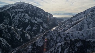 5.5K aerial stock footage approach Provo Canyon through snowy Wasatch Range in wintertime, Utah Aerial Stock Footage | AX126_240E