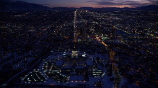 5.5K aerial stock footage fly over Utah State Capitol and approach State Street through Downtown SLC in winter twilight Aerial Stock Footage | AX128_078E