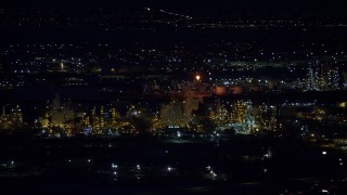 5.5K aerial stock footage of orbiting a large refinery at night in wintertime, Salt Lake City, Utah Aerial Stock Footage | AX128_111E