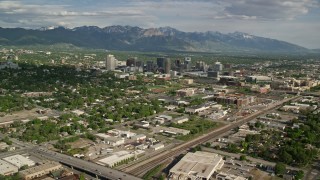 5.5K aerial stock footage flyby city buildings, homes, sports fields, Downtown Salt Lake City, Utah Aerial Stock Footage | AX129_006E