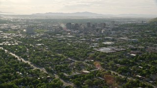 5.5K stock footage video fly over neighborhoods, approach buildings in Downtown Salt Lake City, Utah Aerial Stock Footage | AX129_143E