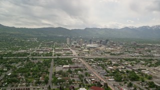 5.5K aerial stock footage of flying over Interstate 15 with a view of Downtown Salt Lake City, Utah Aerial Stock Footage | AX130_003E