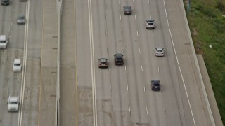 5.5K aerial stock footage track a black SUV on I-15, light traffic, Salt Lake City, Utah Aerial Stock Footage | AX130_013E