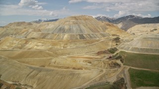 5.5K aerial stock footage of passing by Bingham Canyon Mine (Kennecott Copper Mine), Utah Aerial Stock Footage | AX130_033E