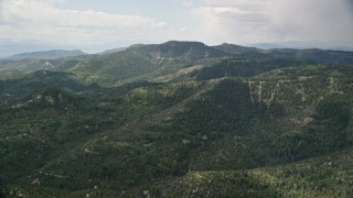 5.5K aerial stock footage flyby green mountains and trees, Wasatch Range, Utah Aerial Stock Footage | AX130_131E