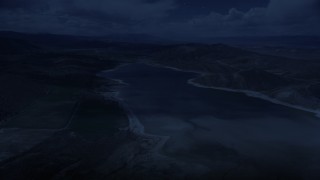 4K day for night color corrected aerial footage of flying over Gunnison Reservoir, low water, Sanpete County, Utah Aerial Stock Footage | AX130_152_DFN