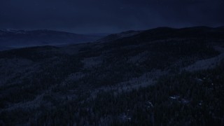 4K day for night color corrected aerial footage fly over mountain slopes, evergreen forest and aspen trees, Fishlake National Forest, Utah Aerial Stock Footage | AX130_200_DFN