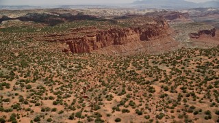 5.5K aerial stock footage approach and pan across mesa near Mummy Cliff, Capitol Reef National Park, Utah Aerial Stock Footage | AX130_257E