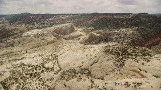 5.5K aerial stock footage of rock formations at Waterpocket Fold, Capitol Reef National Park, Utah Aerial Stock Footage | AX130_328