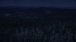 4K day for night color corrected aerial footage of flying by mountains, valleys, Dixie National Forest, Utah Aerial Stock Footage | AX130_357_DFN