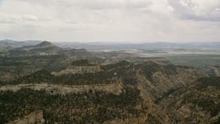 5.5K aerial stock footage of flying by mountain ridges, Grand Staircase-Escalante National Monument, Utah Aerial Stock Footage | AX130_417E