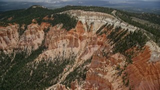 AX131_030E - 5.5K aerial stock footage of flying toward Rainbow Point, Bryce Canyon National Park, Utah