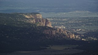 AX131_037 - 5.5K aerial stock footage of flying by cliff rock formations, Grand Staircase-Escalante National Monument, Utah