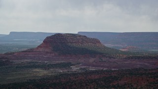 5.5K aerial stock footage flyby Steamboat Rock butte, Glen Canyon National Recreation Area, Utah, Arizona Aerial Stock Footage | AX131_075