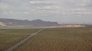 5.5K aerial stock footage of flying by Highway 89, reveal small town, Glen Canyon National Recreation Area, Utah, Arizona Aerial Stock Footage | AX131_107E