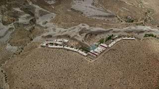 AX131_124 - 5.5K aerial stock footage flyby the Amangiri Resort, Glen Canyon National Recreation Area, Utah, Arizona