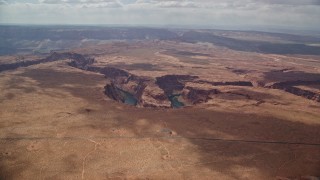 5.5K aerial stock footage of approaching Horseshoe Bend, and the Colorado River in Glen Canyon, Arizona Aerial Stock Footage | AX131_172E