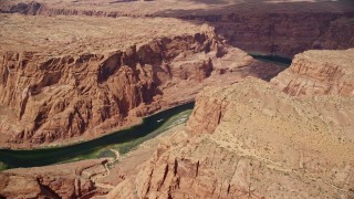 5.5K aerial stock footage of flying over Colorado River through Glen Canyon, Arizona Aerial Stock Footage | AX131_198E